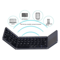 B033 Mini Wireless Folding Bluetooth Keyboard with built-in touchpad for mobile and laptop use, available at DK Laptops Nairobi.